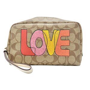 Coach Signature Canvas Wristlet With LOVE Graphic Design 8 x 4.5 x 3 Inches NWT